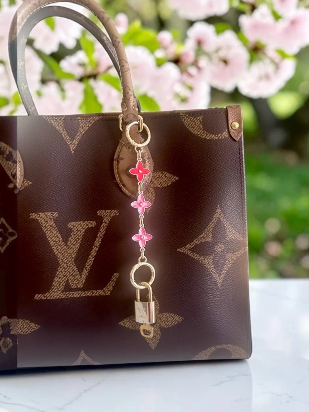 Louis Vuitton Padlock with Unbranded Flower Bag Charm